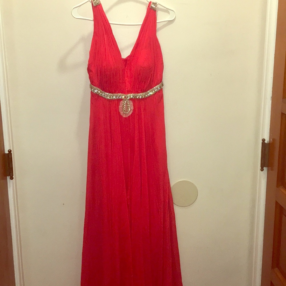 A red gown in good condition.